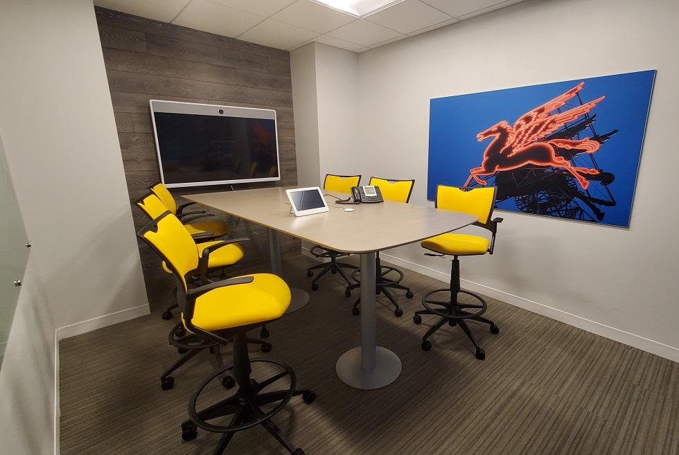 Collaborative team room with sit/stand desk and 'high' chair seating